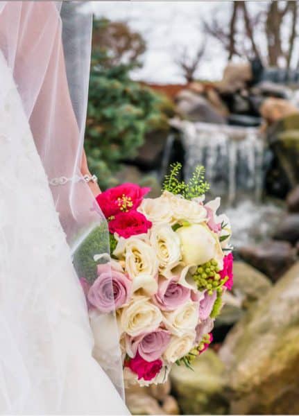 Bride holding flowers at the Tiffany Ballroom